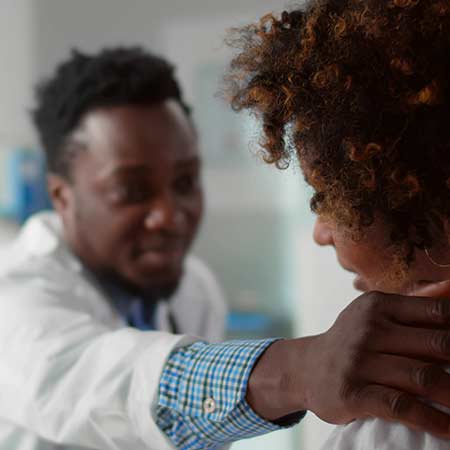 a doctor consoling a patient